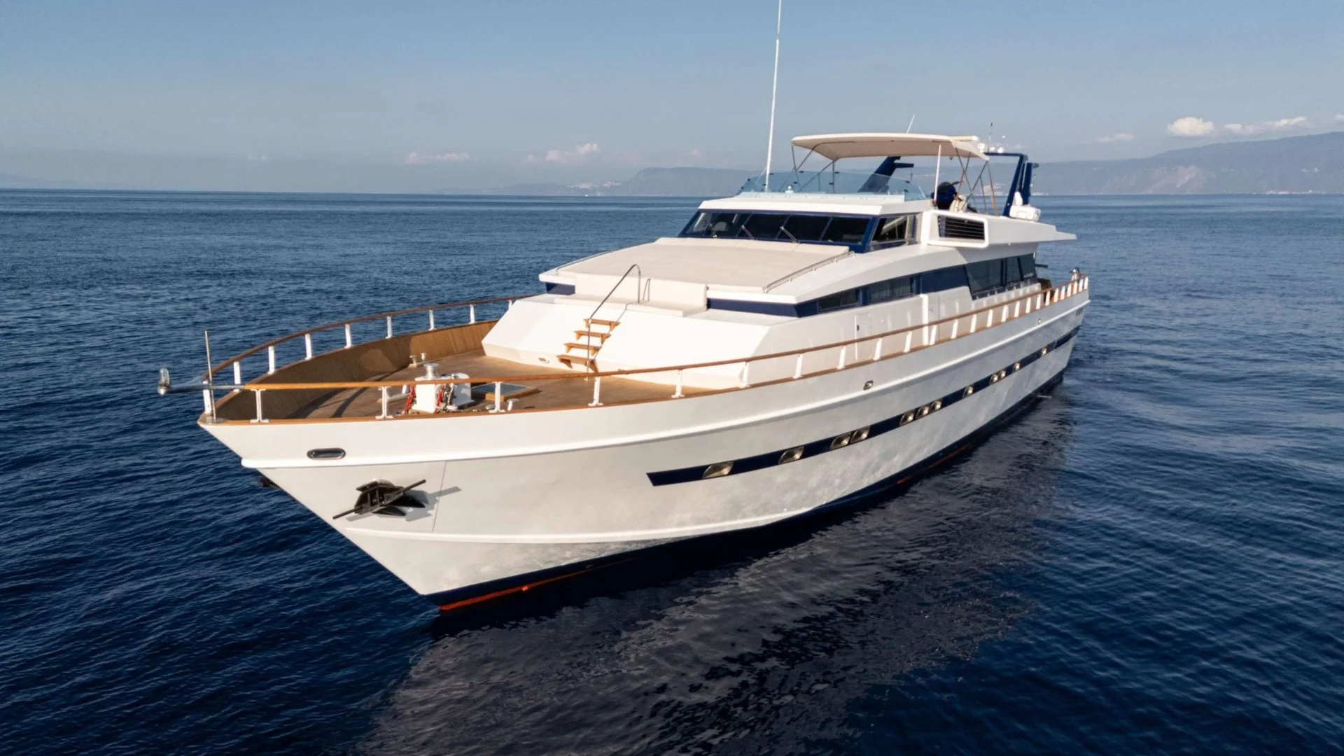 Elegant yacht cruising on calm waters