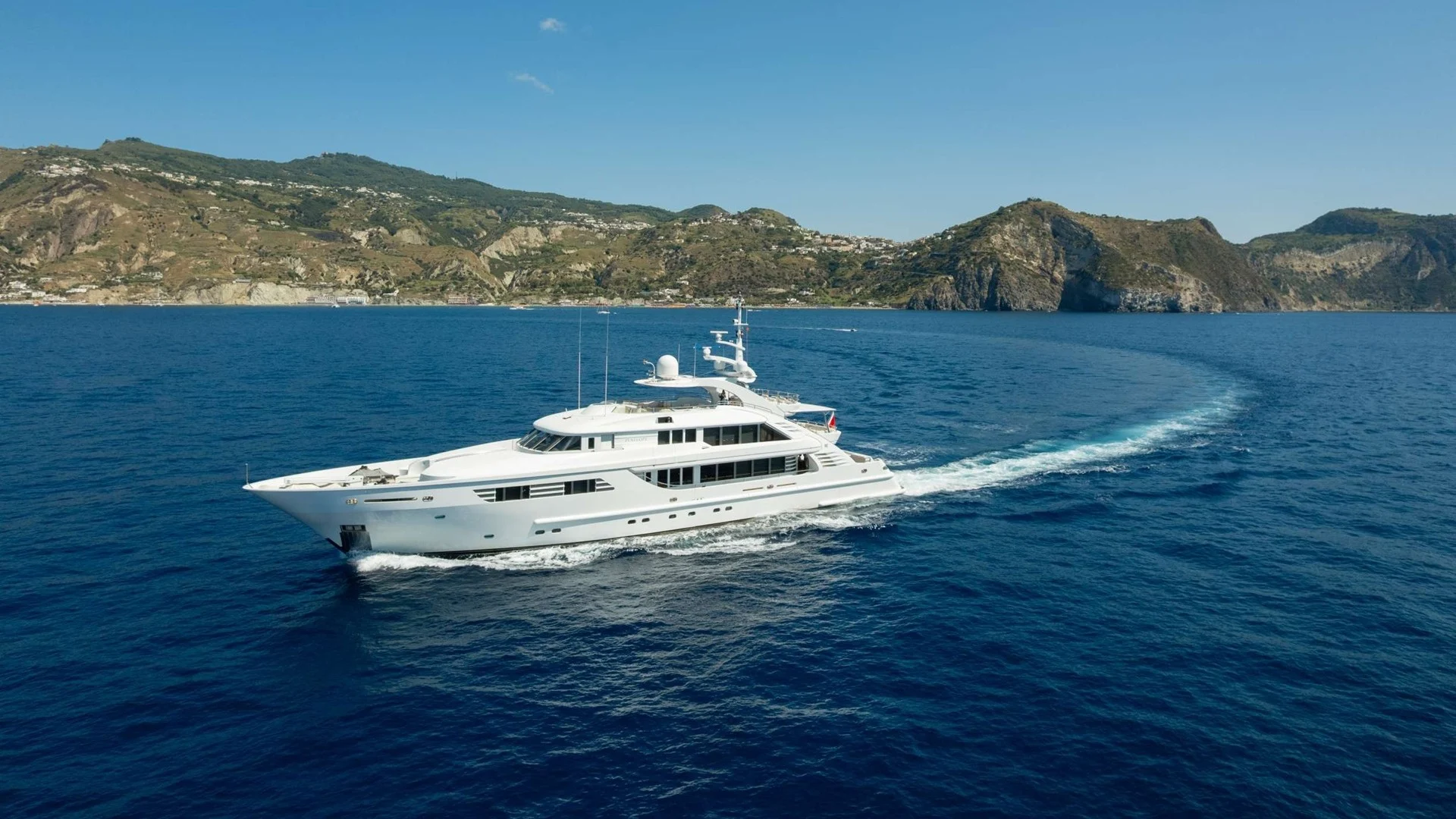 Luxury yacht cruising in blue waters